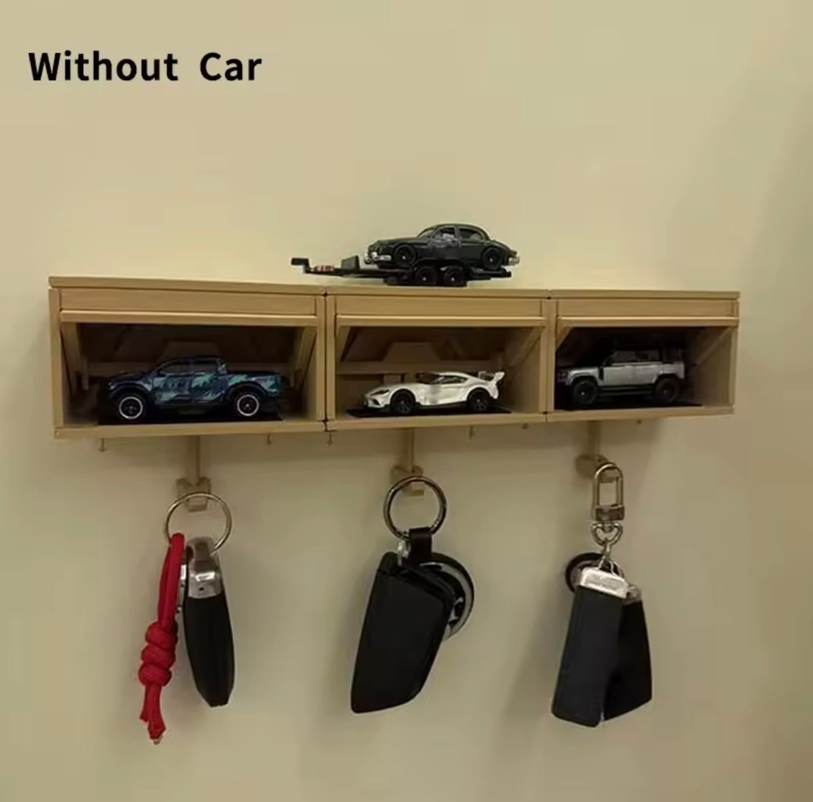 Soporte para llaves de garaje de coche con puerta de apertura.